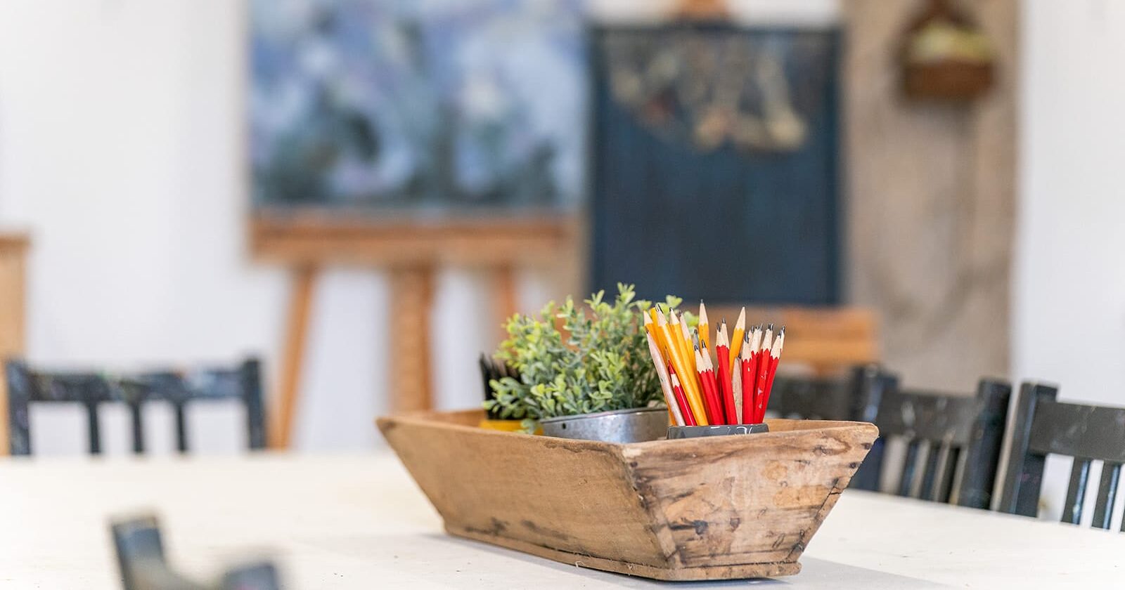 wooden trug holding pencils